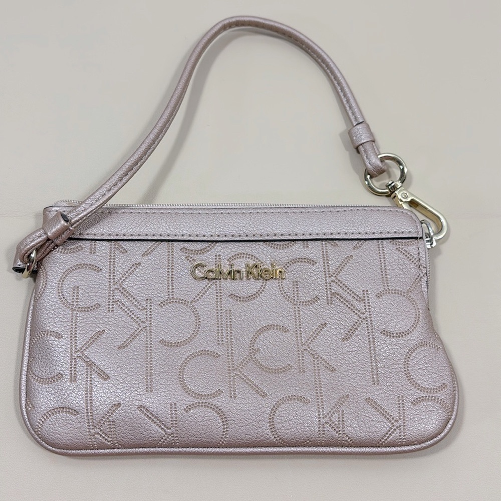 Calvin Klein signature metallic tan wristlet​​​​​​​​​​
